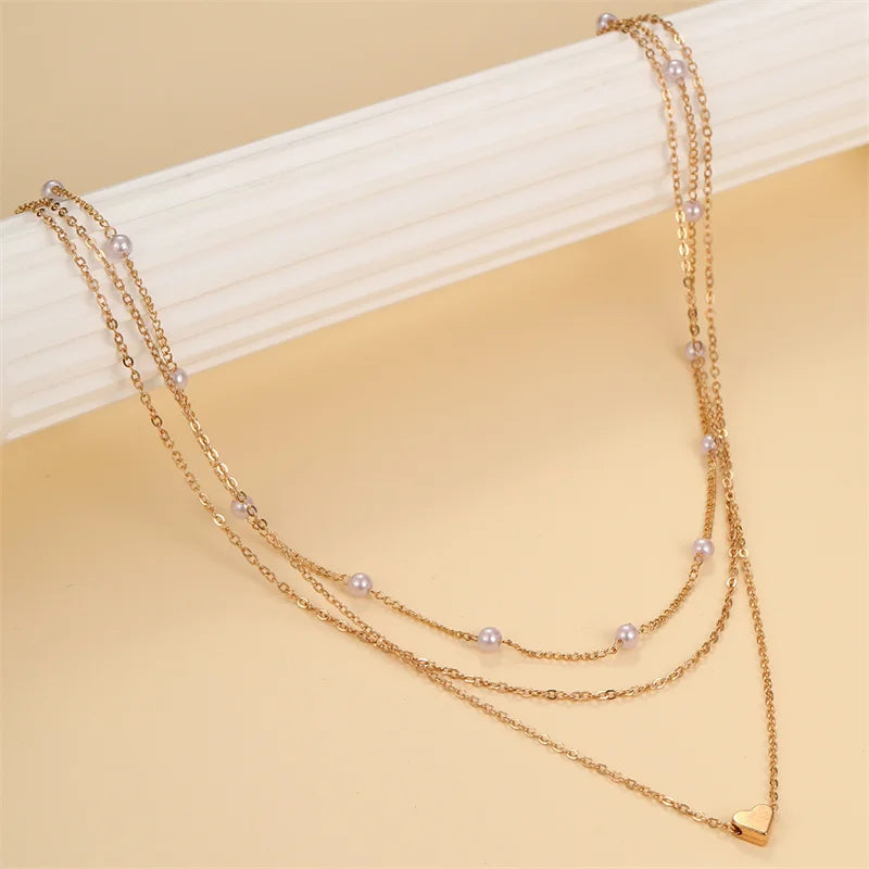 Multilayer Pearl Cross & Heart Pendant Necklace – Gold Color Fashion Jewelry for Women 2024 Trend